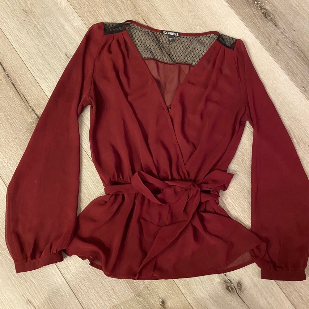 Peplum sheer top